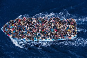 June 7, 2014 - Mediterranean Sea / Italy: Italian navy rescues asylum seekers traveling by boat off the coast of Africa. Photograph: Massimo Sestini/Polaris
