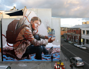 'The refugee' mural by  Sydney street artist Fintan Magee.